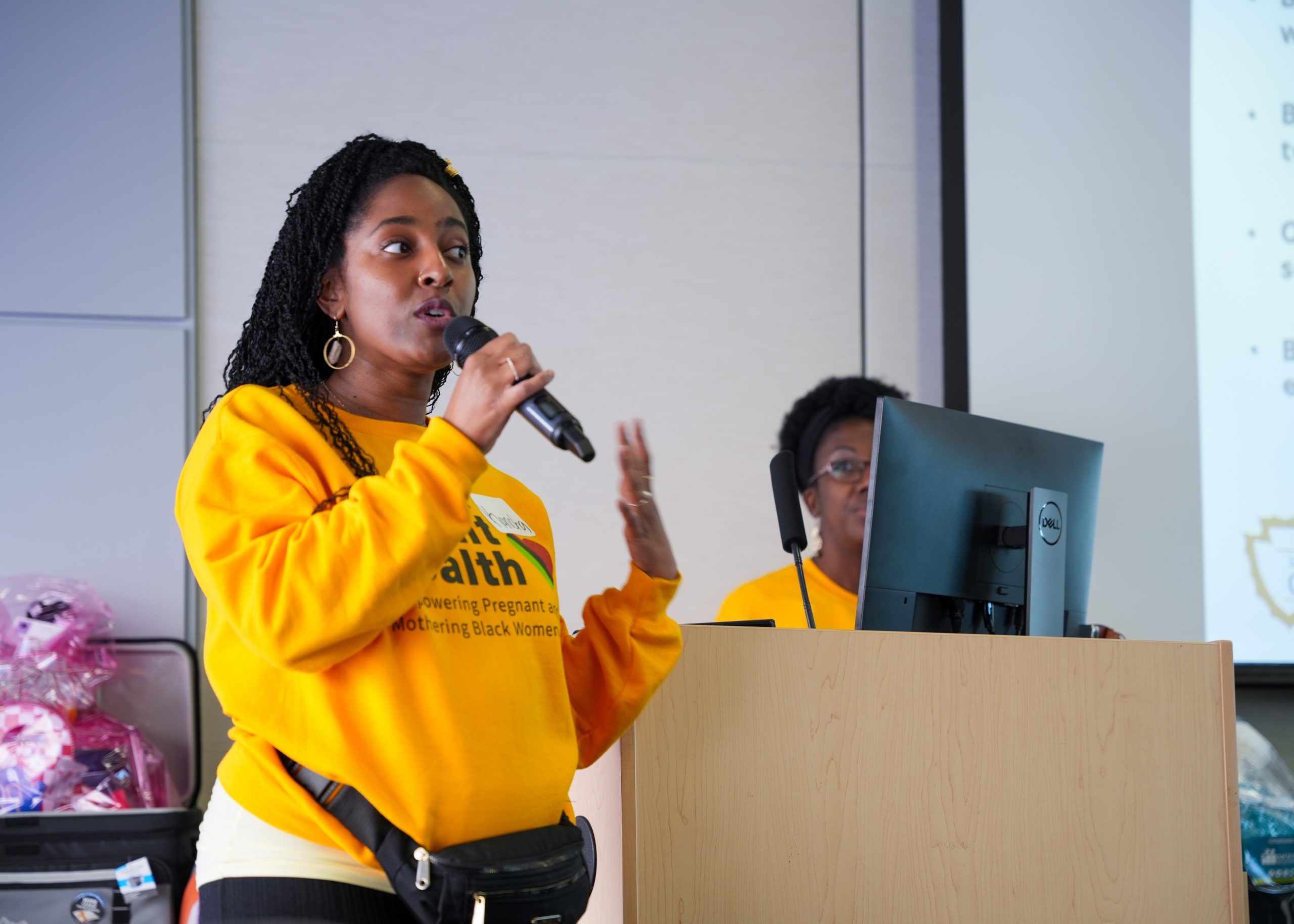 Kanisha Neal co-hosting the event and welcoming attendants.