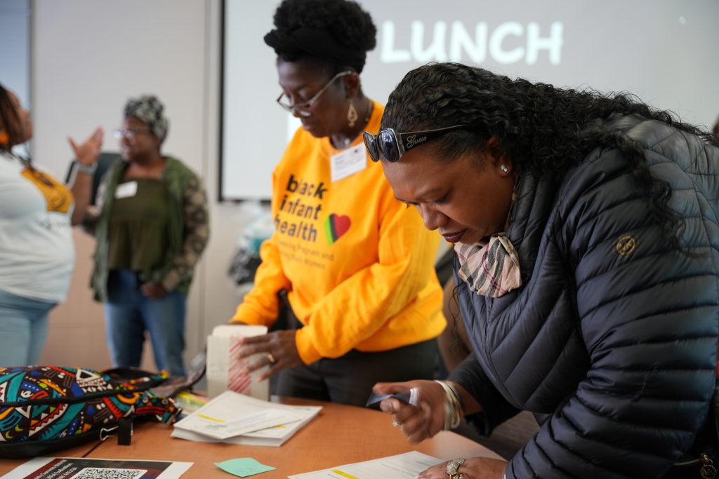 A resident signing up to receive more resources and information.