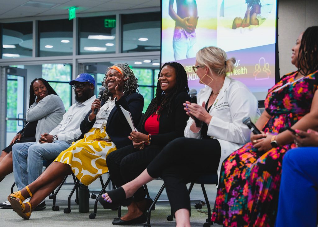 Event speakers discussing perinatal equity.