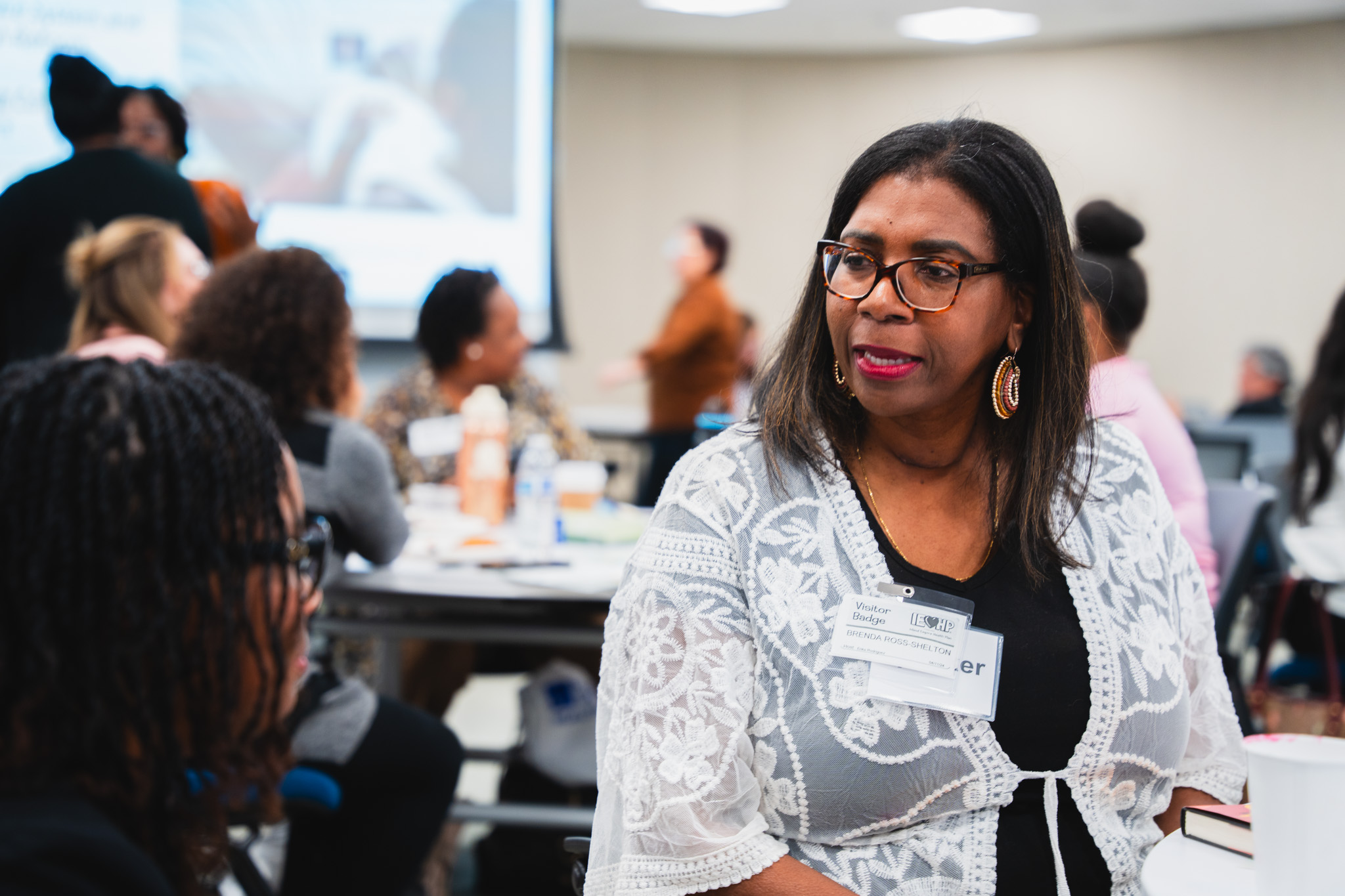 Female volunteer at Perinatal Equity Initiative (PEI) Provider and Community Summit